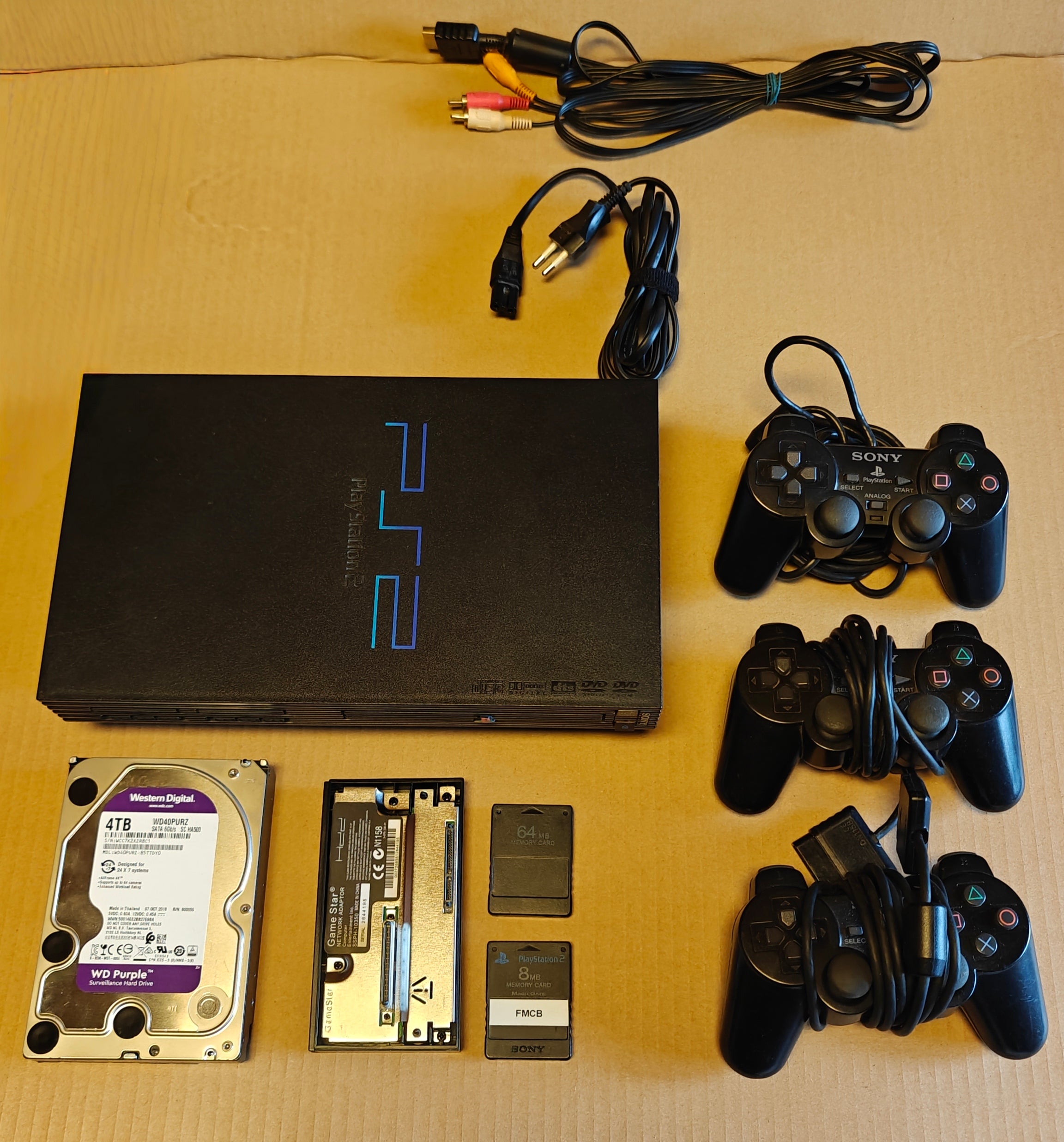 PS2 + 1/2/4 TB Festplatte + Softmod/FMCB