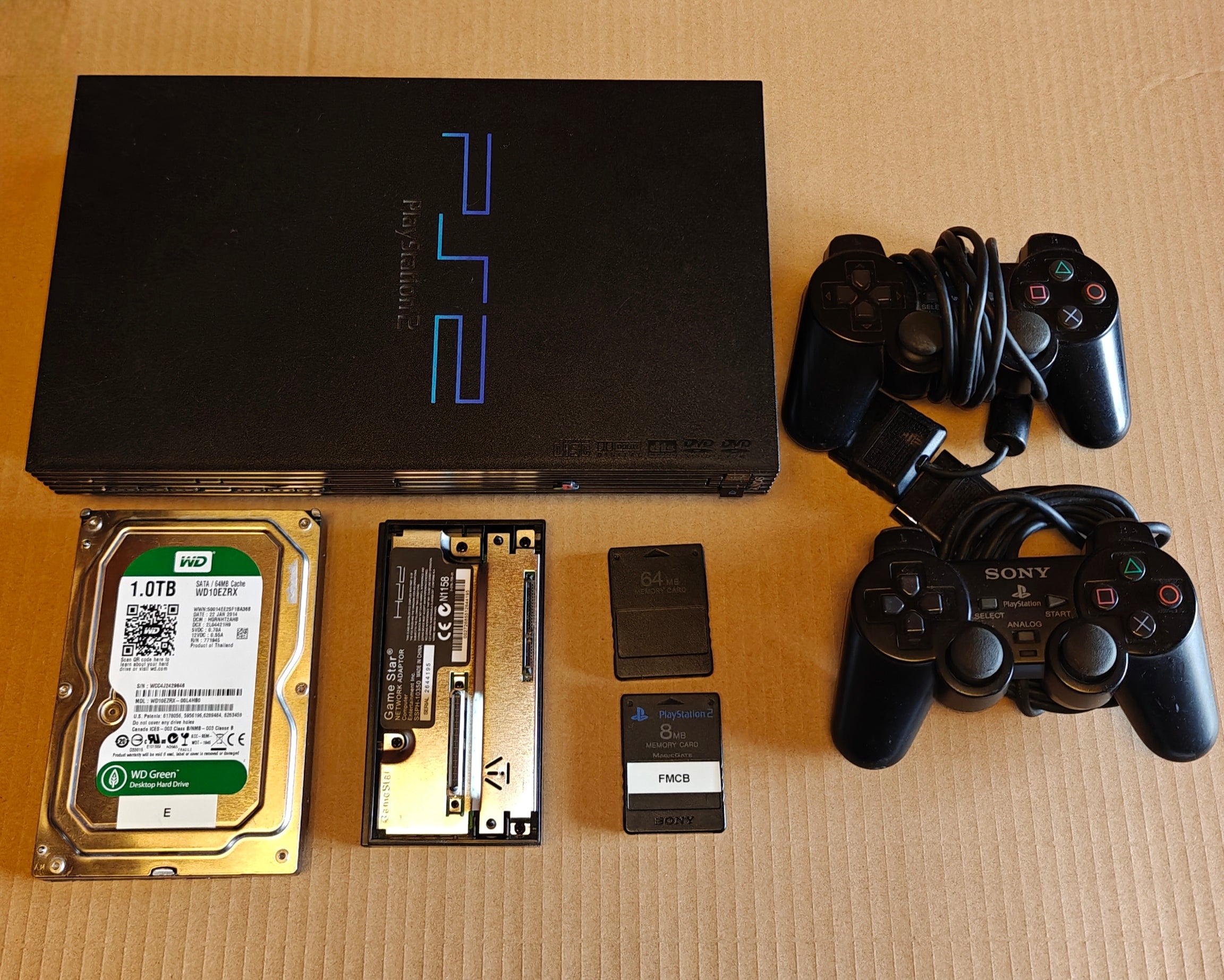 PS2 + 1/2/4 TB Festplatte + Softmod/FMCB