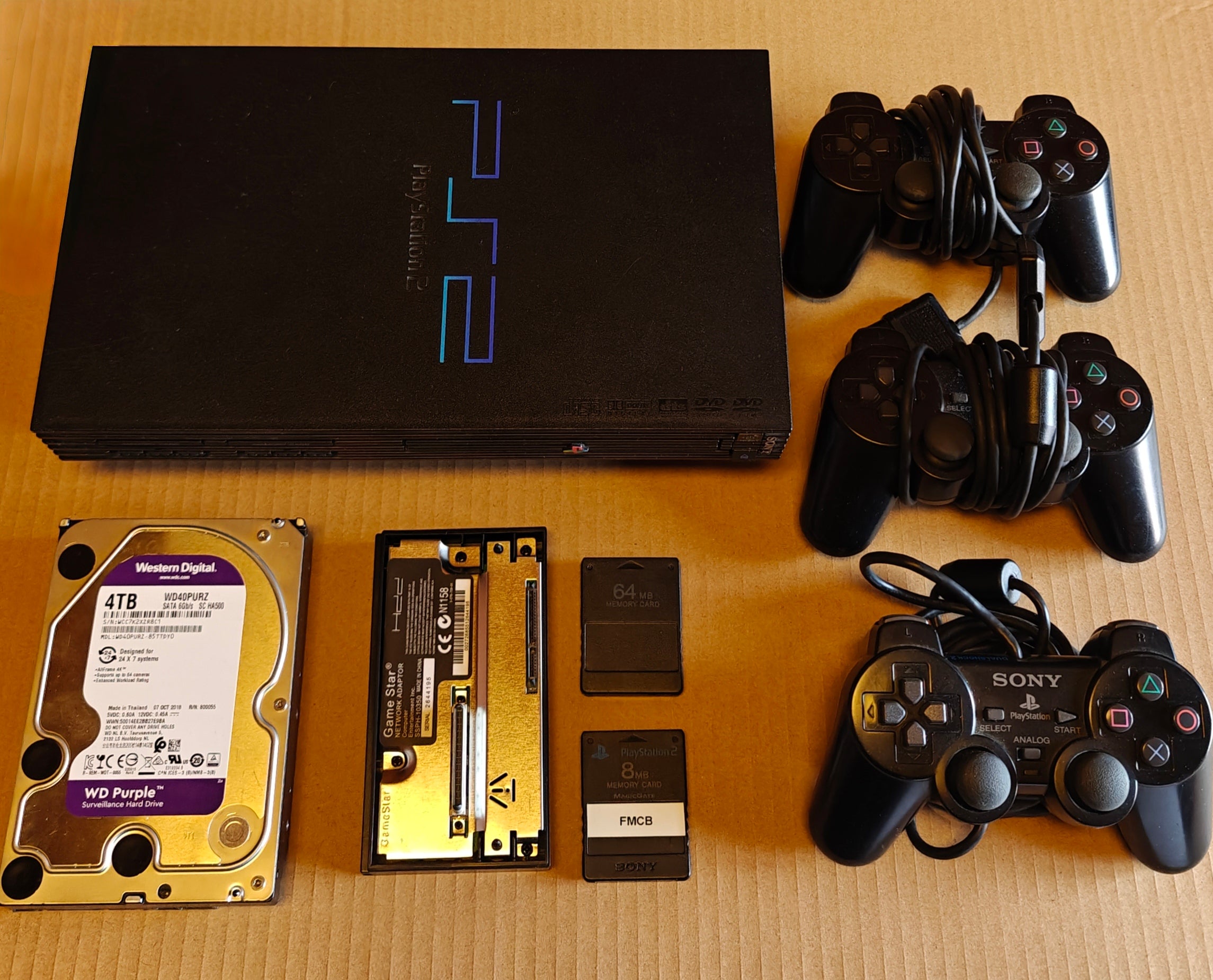 PS2 + 1/2/4 TB Festplatte + Softmod/FMCB