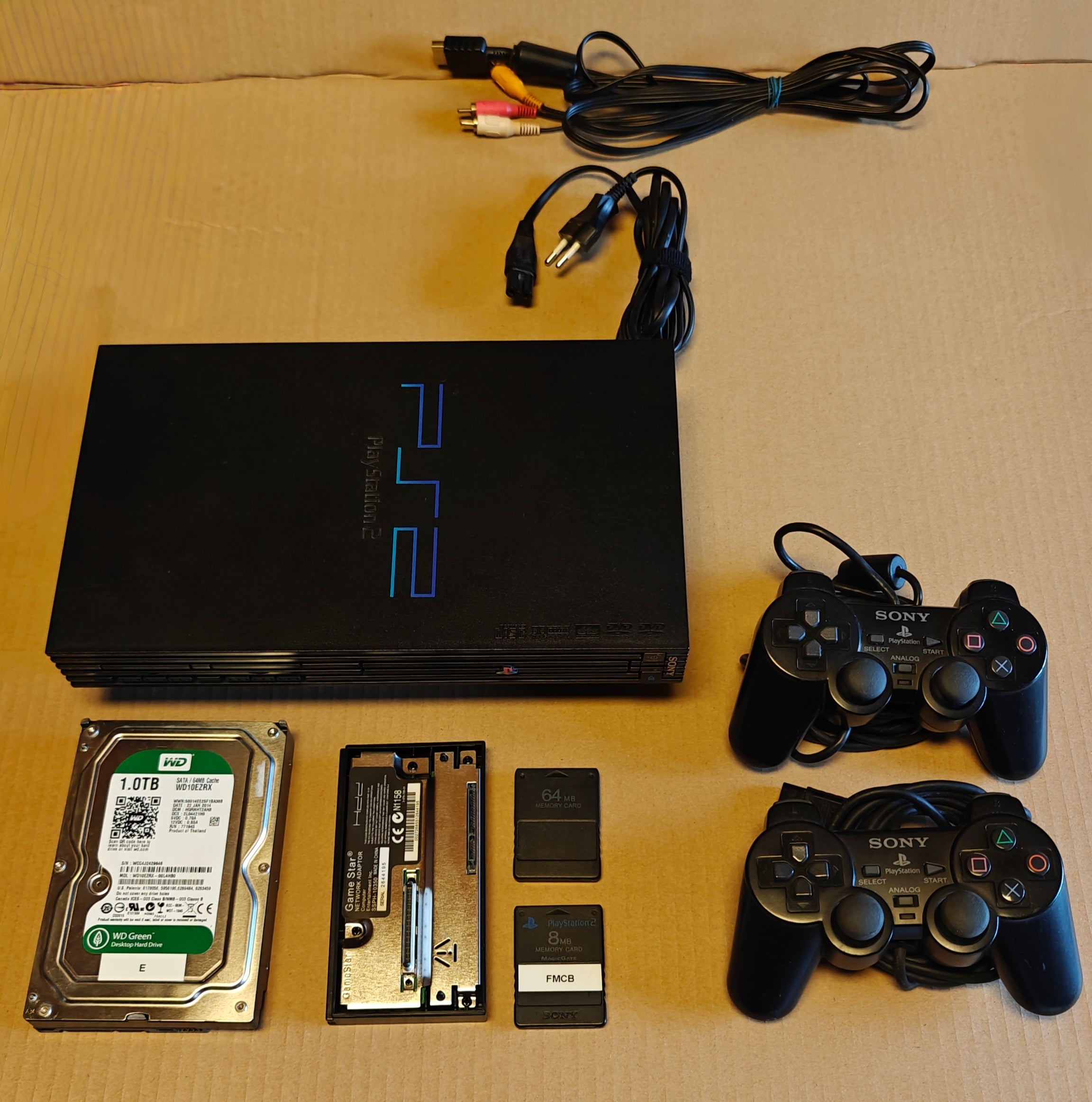 PS2 + 1/2/4 TB Festplatte + Softmod/FMCB