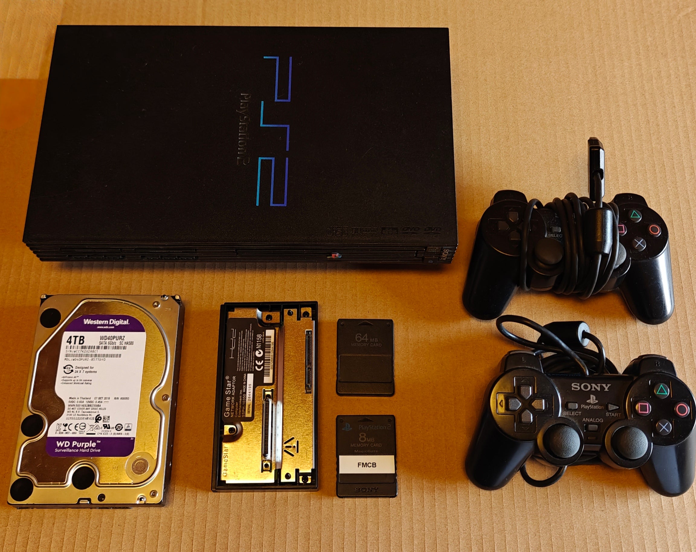 PS2 + 1/2/4 TB Festplatte + Softmod/FMCB