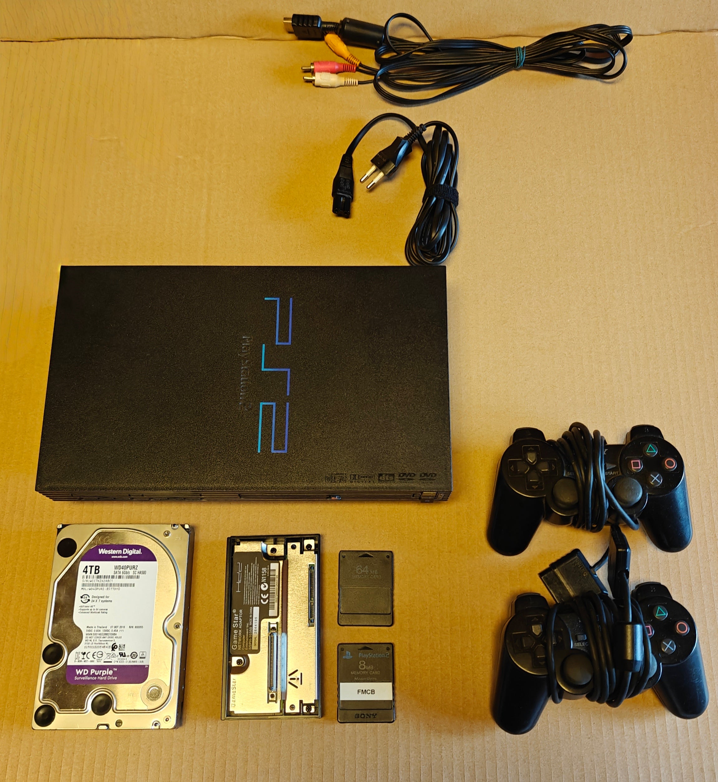 PS2 + 1/2/4 TB Festplatte + Softmod/FMCB